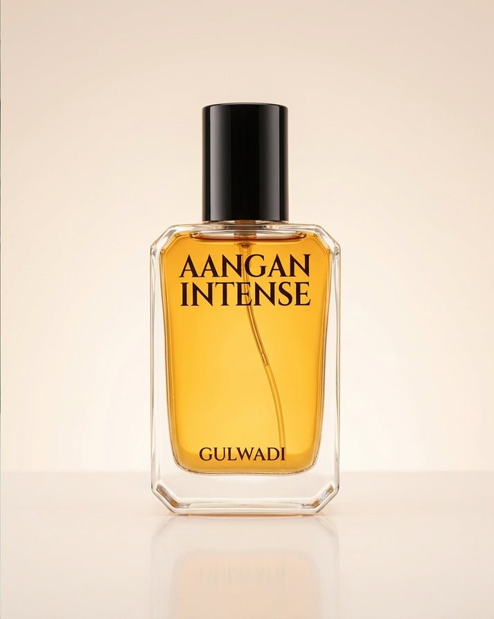 A bottle of Aangan Intense, a luxurious unisex oriental perfume with rich notes of oud and leather.