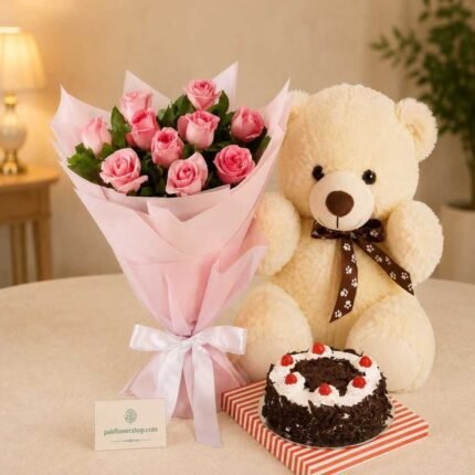 Pink rose bouquet, teddy bear, and cake for birthday gift delivery Lahore.