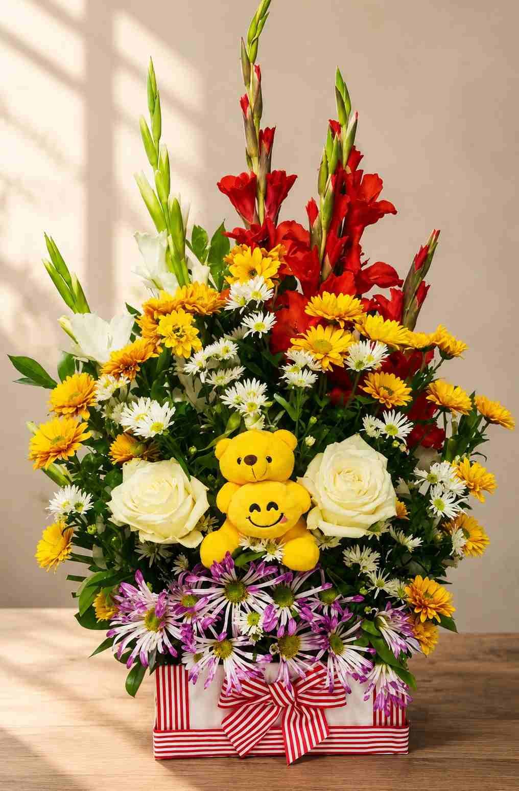 Flower gift box Lahore with teddy bear and colorful fresh flowers