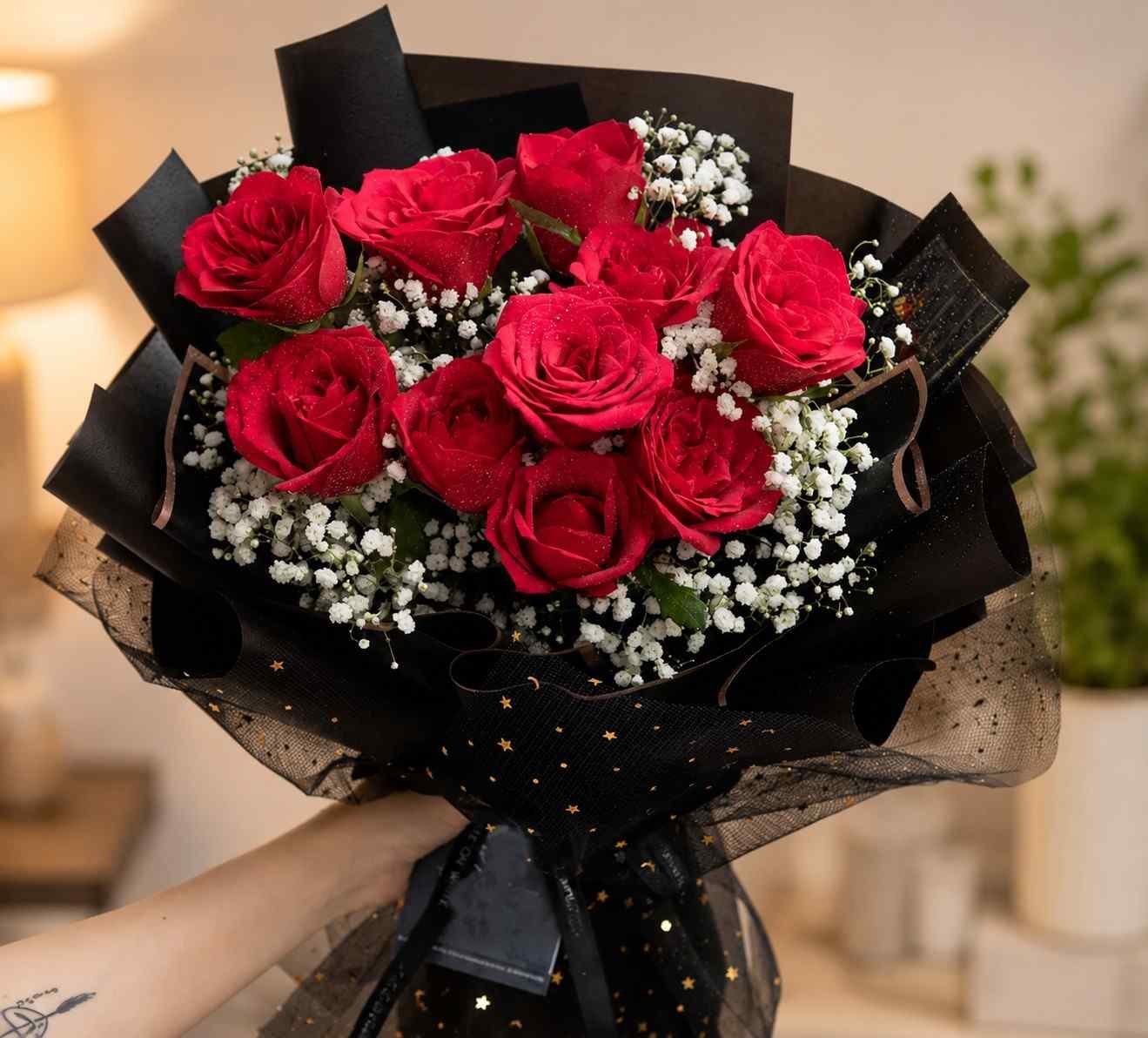 Red Rose Bouquet Pakistan with fresh roses and elegant black wrapping