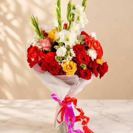 Mixed flower bouquet Lahore with red roses and white gladiolus.