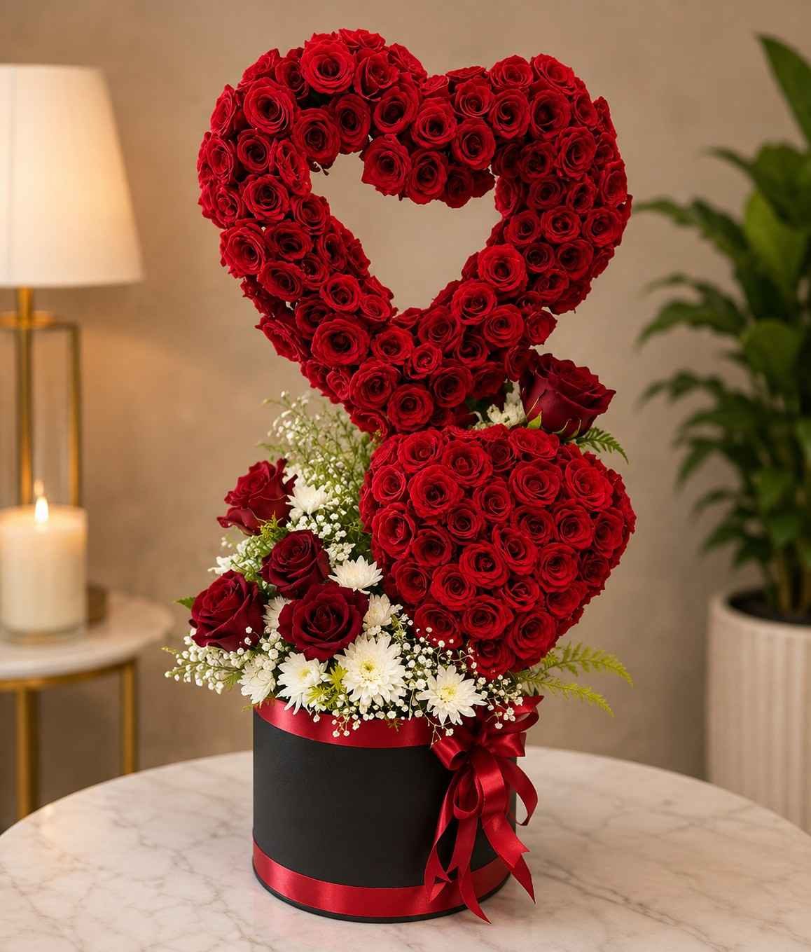 Rose Arrangement Lahore with fresh red roses in a heart-shaped stand.