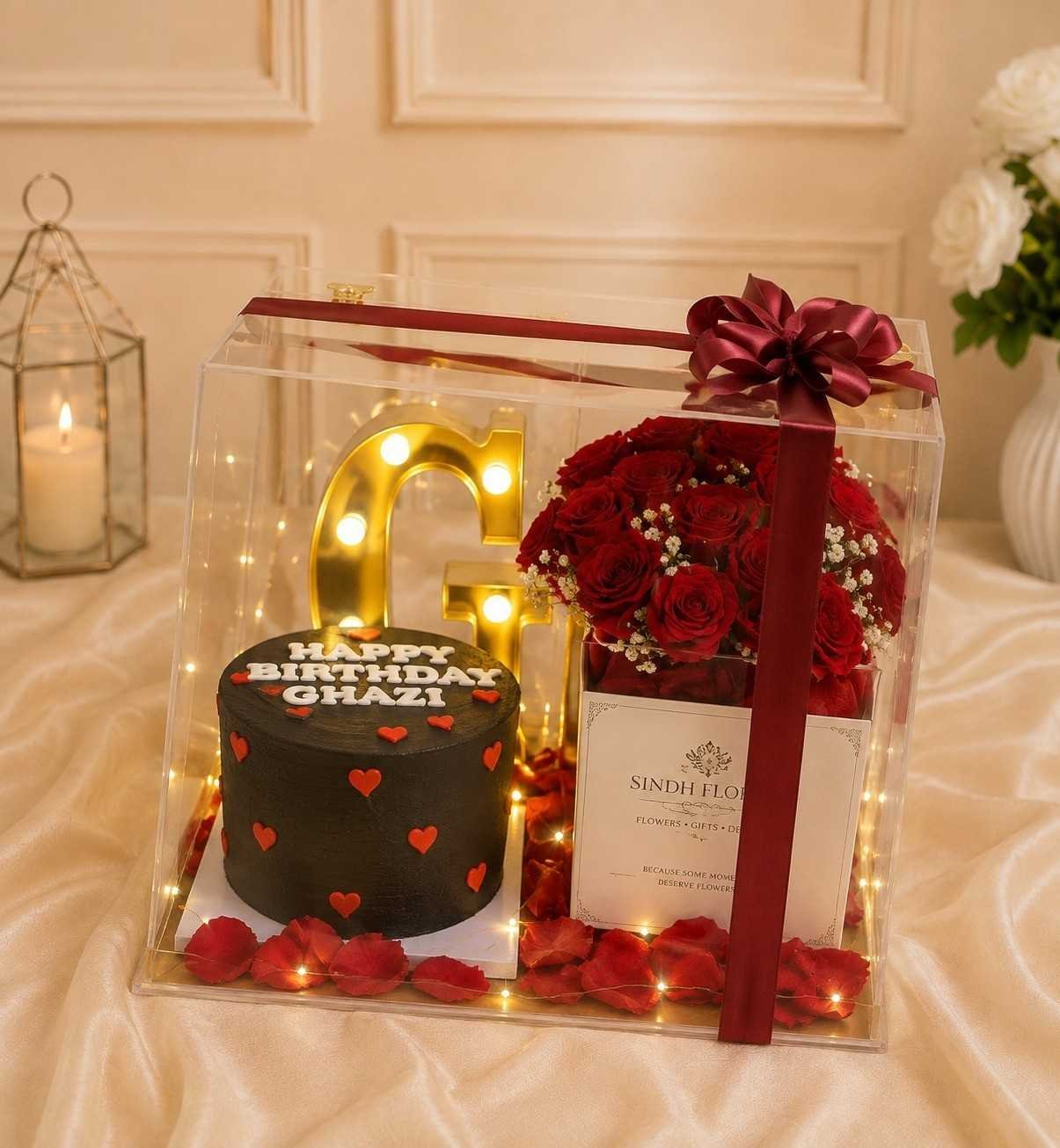 Birthday Flower Box Lahore with red roses, cake and golden letter
