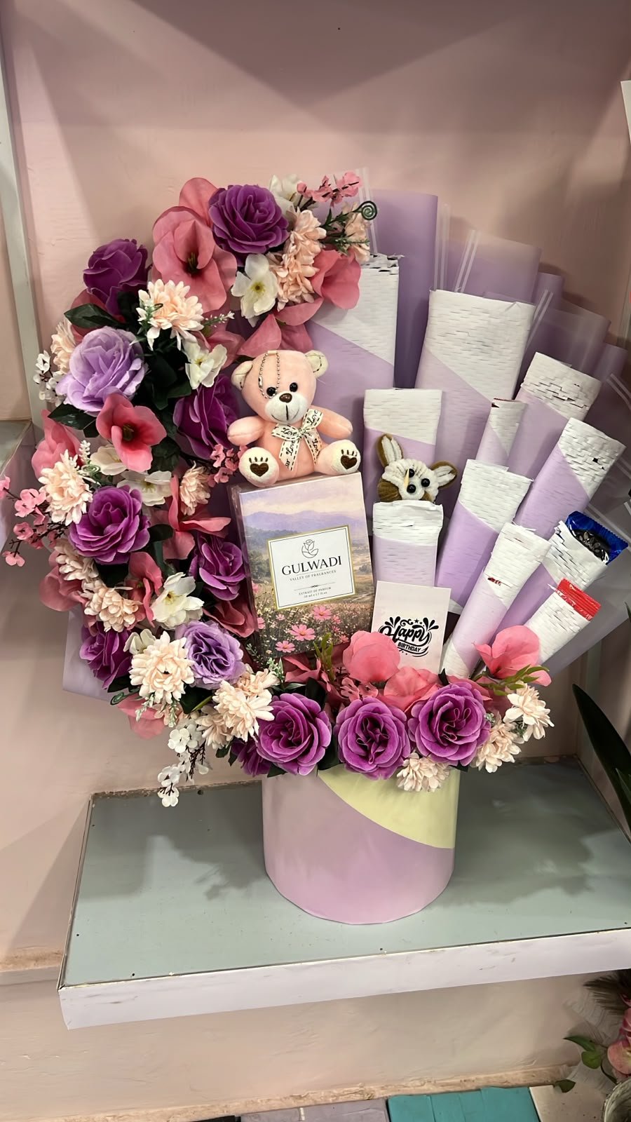 Cute pink and purple birthday gift delivery Lahore with teddy and perfume