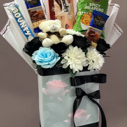 Chocolate snack gift bag with white teddy and blue rose