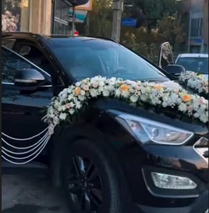 Elegant white floral bridal car flower decoration Lahore